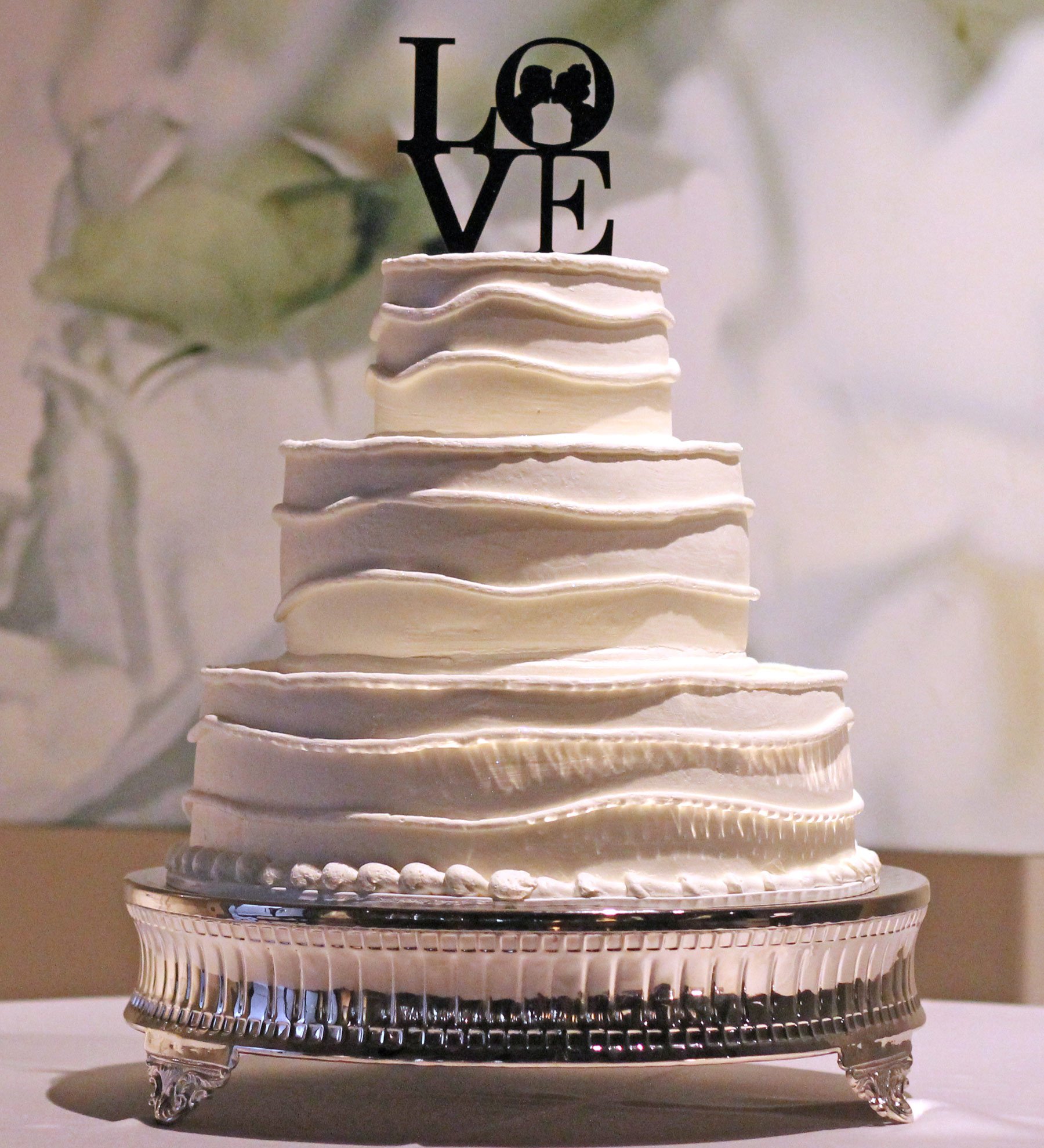 Round wedding cakes on stands