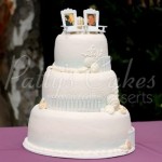 beach-wedding-cake-white-fence-photos