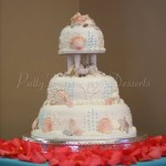 wedding-cake-sea-shell-beach-orange-flowers