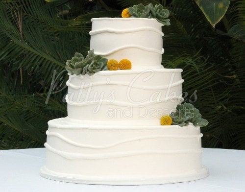 wedding cake white succulents green modern