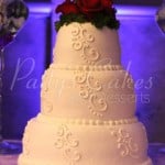 white wedding cake flowers on top