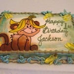 Monkey themed first birthday cake