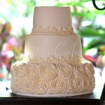white rosette wedding cake