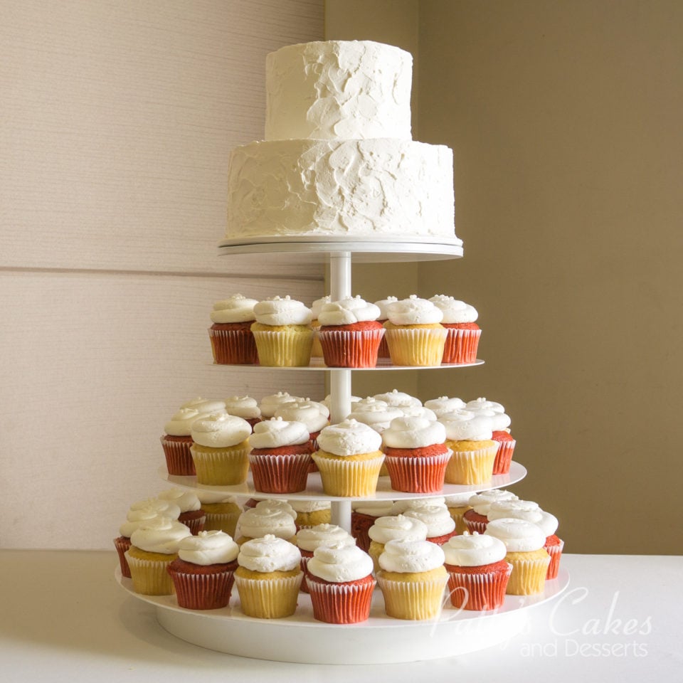 half wedding cake half cupcakes