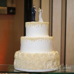 off white rosette wedding cake