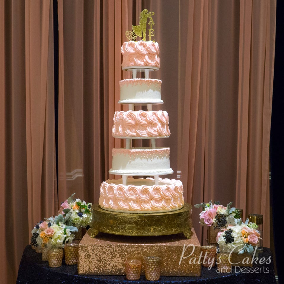 pink 5 tier rosette cake gold stand