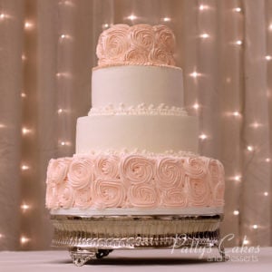 pink rosette wedding cake