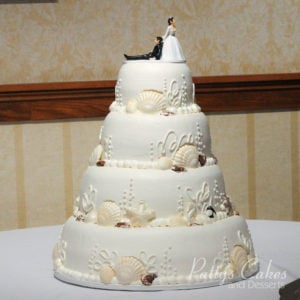 shell beach wedding cake white