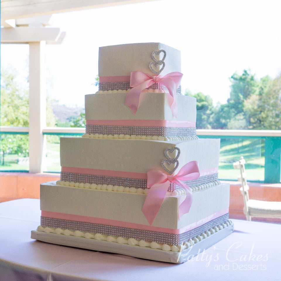 simple pink square wedding cake