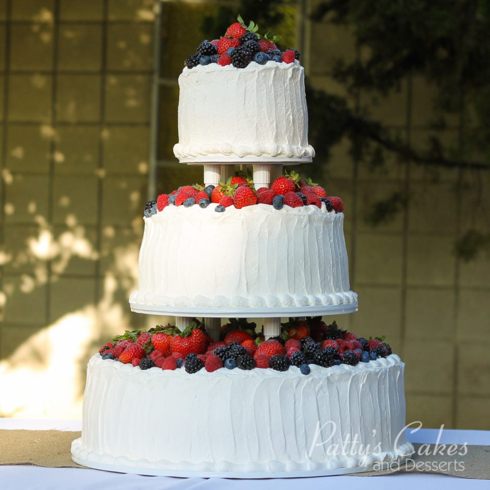 wedding cake berries fresh fruit strawberries white red blueberries round