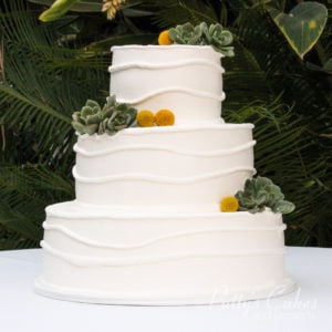 wedding cake white succulents green modern