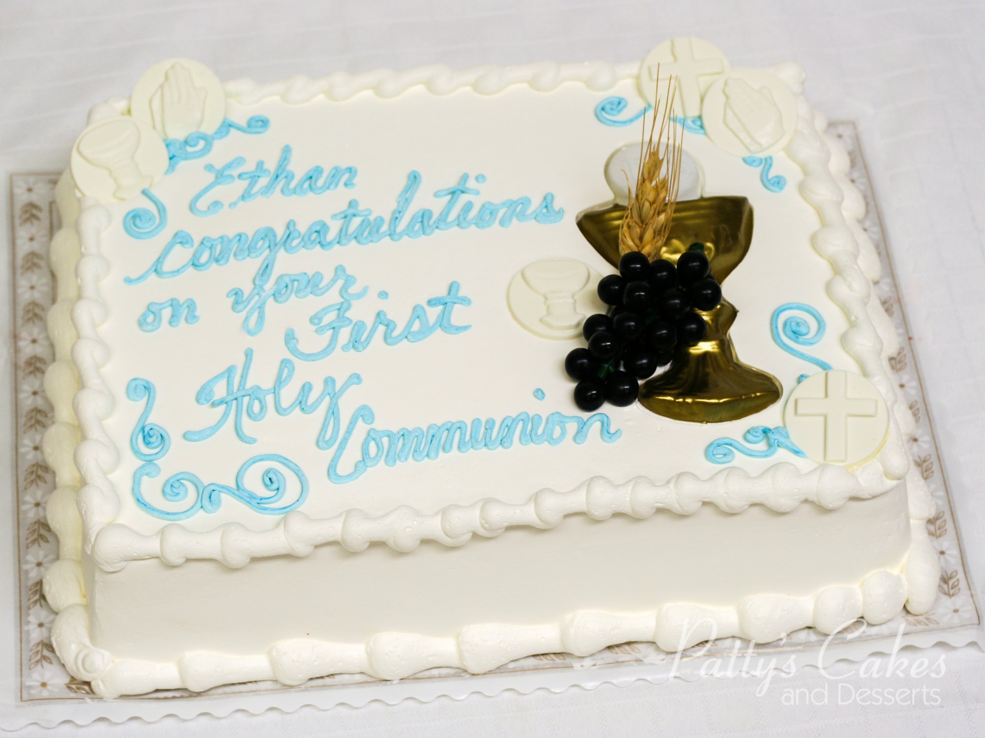 Photo of a first holy communion cake boy Patty's Cakes