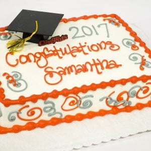 red silver graduation cake