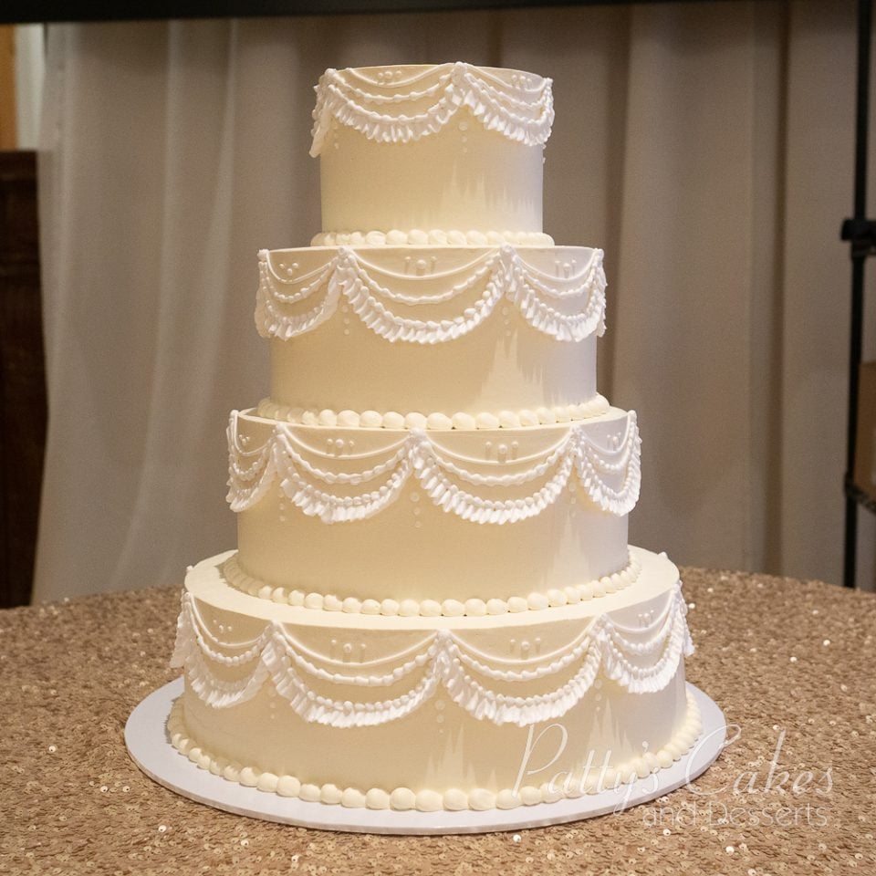 garland off white 4 tier cake
